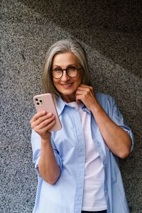Young woman using mobile phone