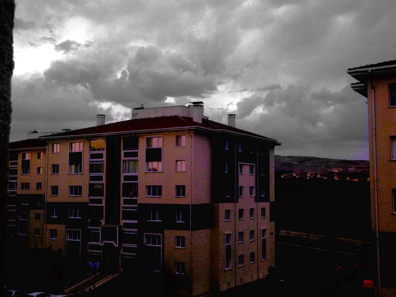 architecture, building exterior, built structure, sky, cloud - sky, residential structure, residential building, city, cloudy, building, house, residential district, low angle view, cloud, window, outdoors, exterior, no people, sunset, dusk