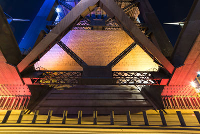 Low angle view of illuminated staircase in building