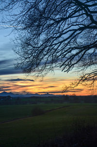 Scenic view of landscape at sunset