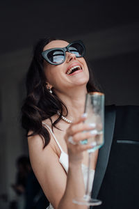 Close-up of a woman drinking glass