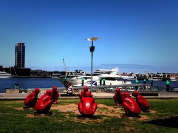 View of sculpture on beach against clear sky