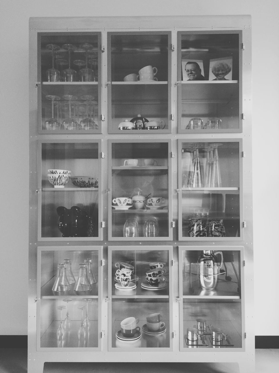 indoors, window, glass - material, full frame, shelf, backgrounds, variation, in a row, order, transparent, arrangement, reflection, side by side, large group of objects, abundance, store, collection, choice, repetition, no people