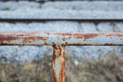 Close-up of rusty metal railing