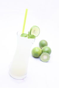 Close-up of fruit against white background