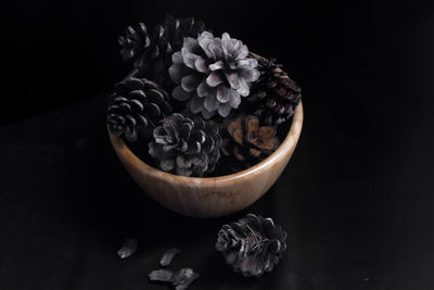 Close-up of flowers in bowl on table