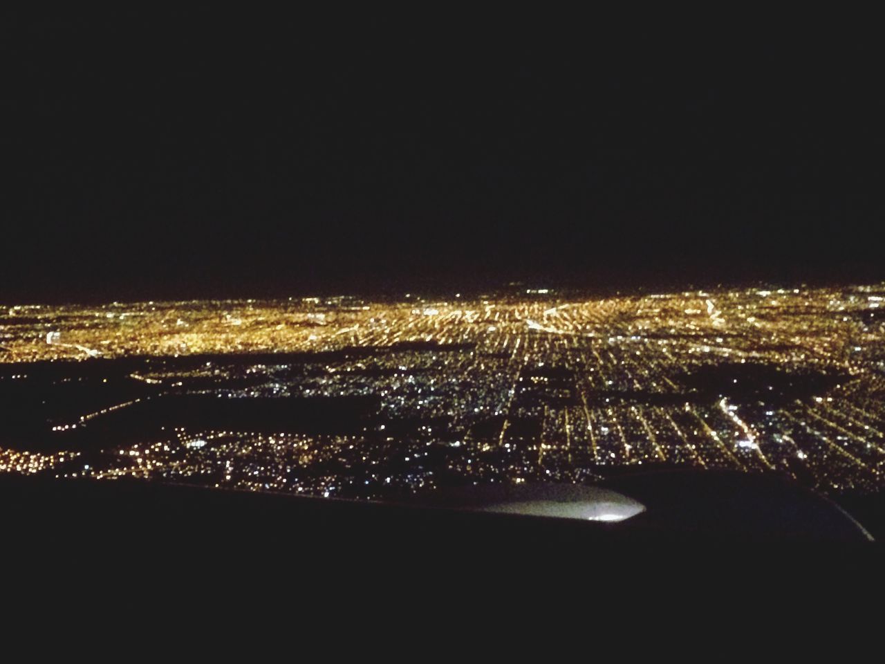 night, illuminated, cityscape, city, copy space, clear sky, high angle view, aerial view, dark, architecture, building exterior, built structure, crowded, modern, city life, no people, light - natural phenomenon, glowing, light, skyscraper