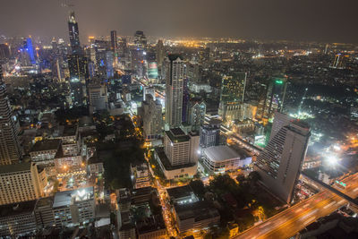 High angle view of illuminated cityscape at night