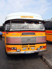 View of yellow car on street