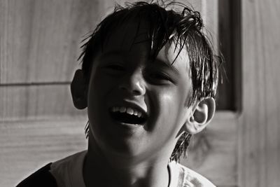 Close-up portrait of cute smiling boy