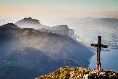 High angle view of cross on cliff