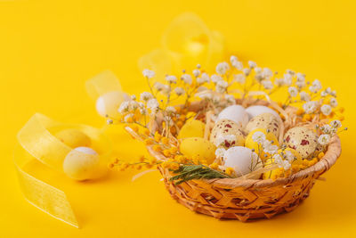 High angle view of christmas decorations against yellow background