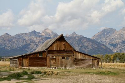 House on field against sky