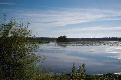 Reflection of clouds in calm lake