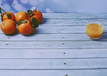 Close-up of oranges on table