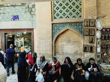 Group of people in front of building