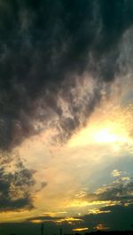 Low angle view of cloudy sky at sunset