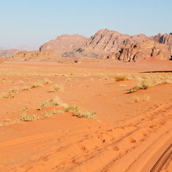 Scenic view of desert against clear sky