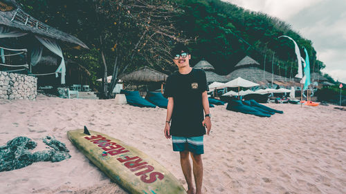 Portrait of man standing on beach