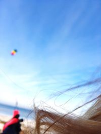 Low angle view of hot air balloon against blue sky