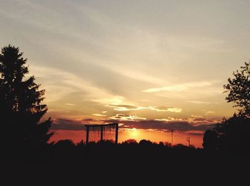 Scenic shot of silhouette landscape against sky at sunset