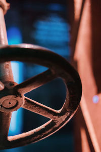 Close-up of hand holding metal