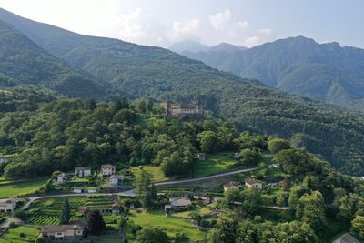 High angle view of trees and mountains against sky