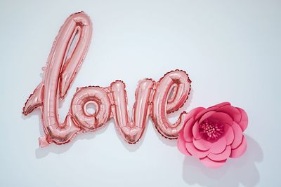 High angle view of heart shape over white background