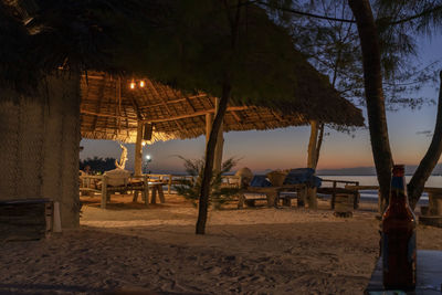 Scenic view of beach against sky at night