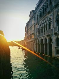 View of canal along buildings