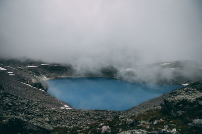 Scenic view of volcanic mountain against sky