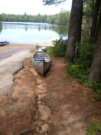 Boat in water against sky