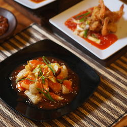 High angle view of fried squid in plate on table