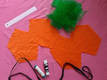 High angle view of multi colored paper on table