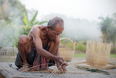 Senior man working outdoors