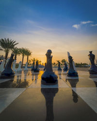 View of chess board against sky during sunset