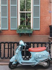 Close-up of bicycle against window