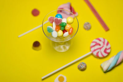 High angle view of candies in container