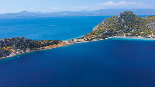 High angle view of swimming pool by sea against sky