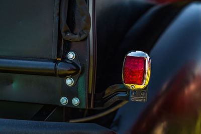 Close-up of man holding car