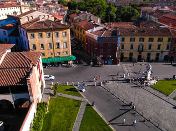 High angle view of street amidst buildings in town