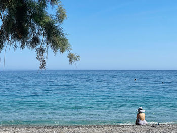 Scenic view of sea against clear sky