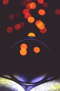Low angle view of illuminated lights