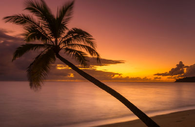 Scenic view of sea at sunset