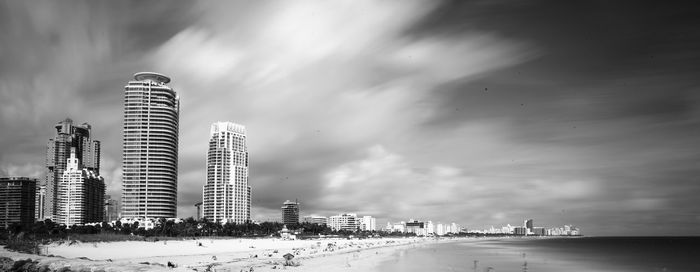 View of buildings against cloudy sky