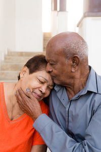 Senior couple sitting together