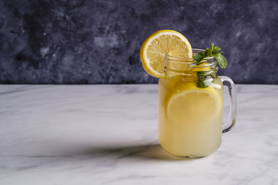 Drink in glass jar on table