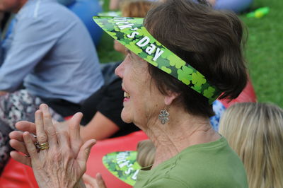 Close-up of women with text