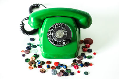 High angle view of telephone booth against white background