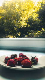 Close-up of strawberries on table